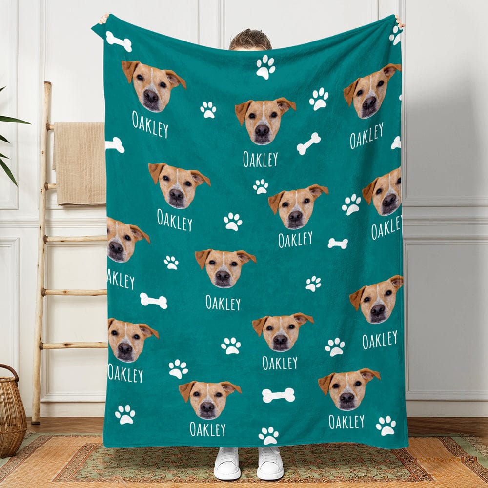 Custom personalized photo blanket from GeckoCustom with a family portrait, on the couch at home
