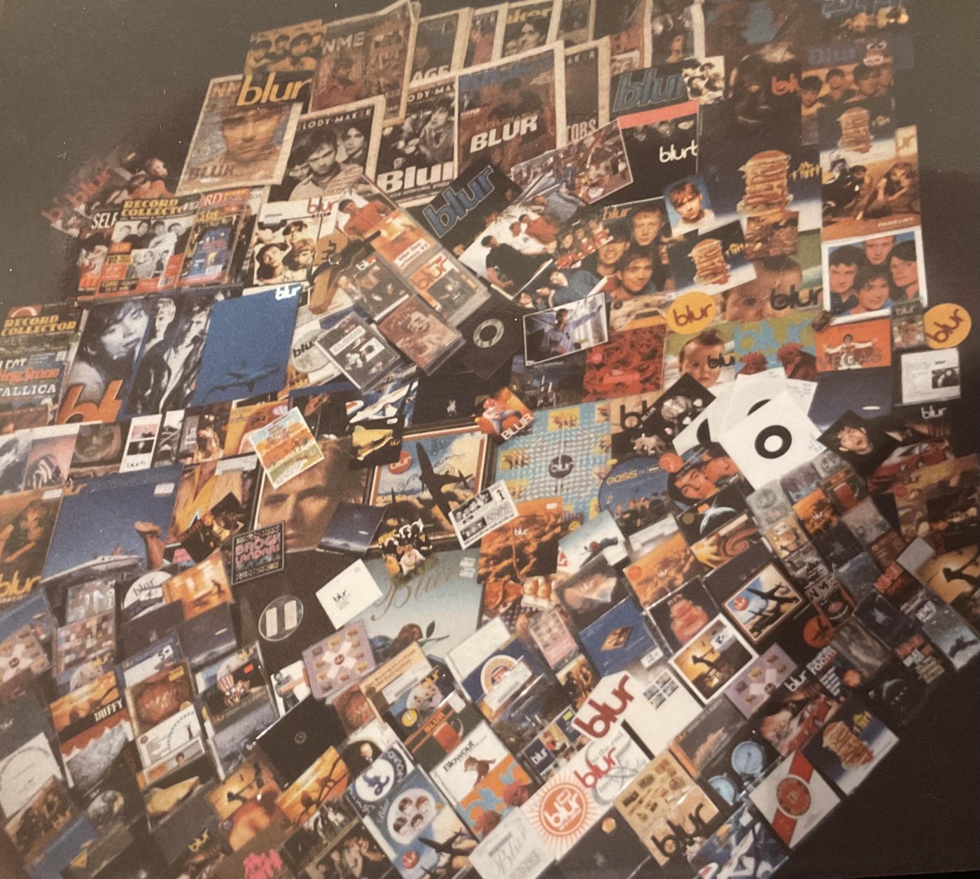 Rare vinyl record collection spread out on a table